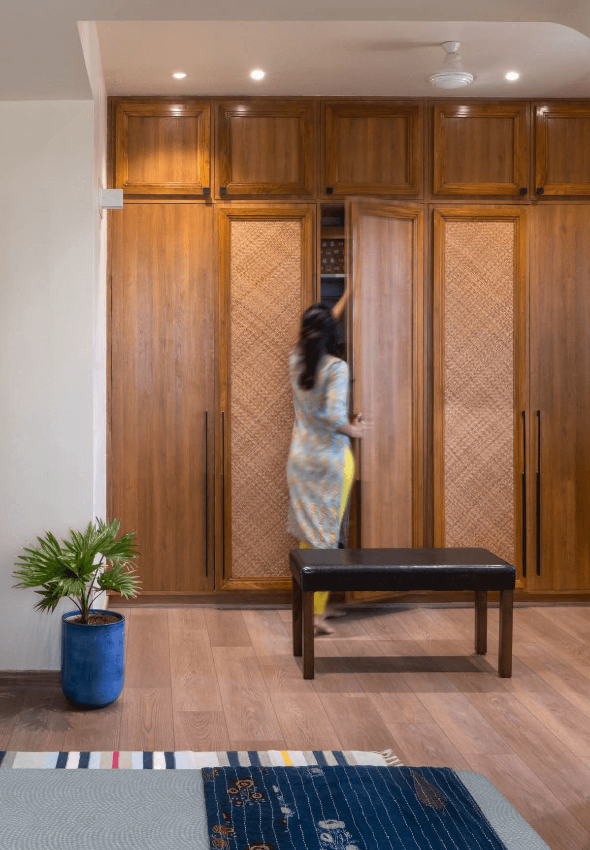 Verte — custom teak wardrobe with cane inlay