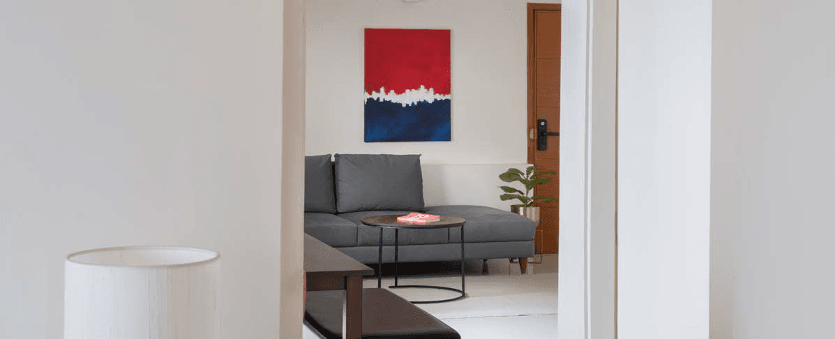 Verte — living room viewed through corridor archway